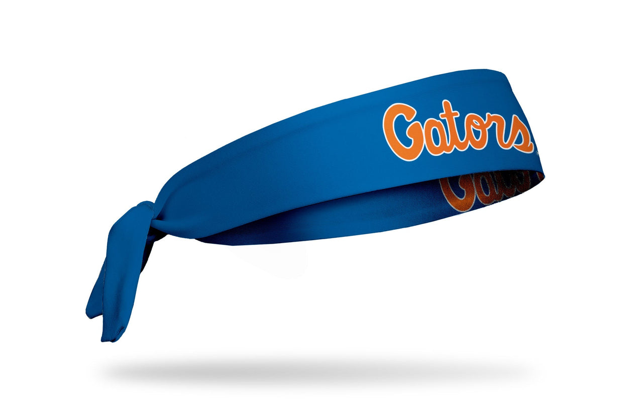 blue headband with University of Florida Gators wordmark logo in orange with white outline