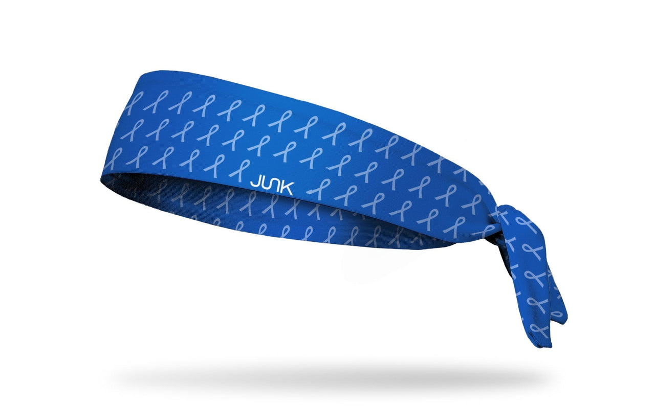 blue headband with repeating light blue ribbon to represent Autism Awareness