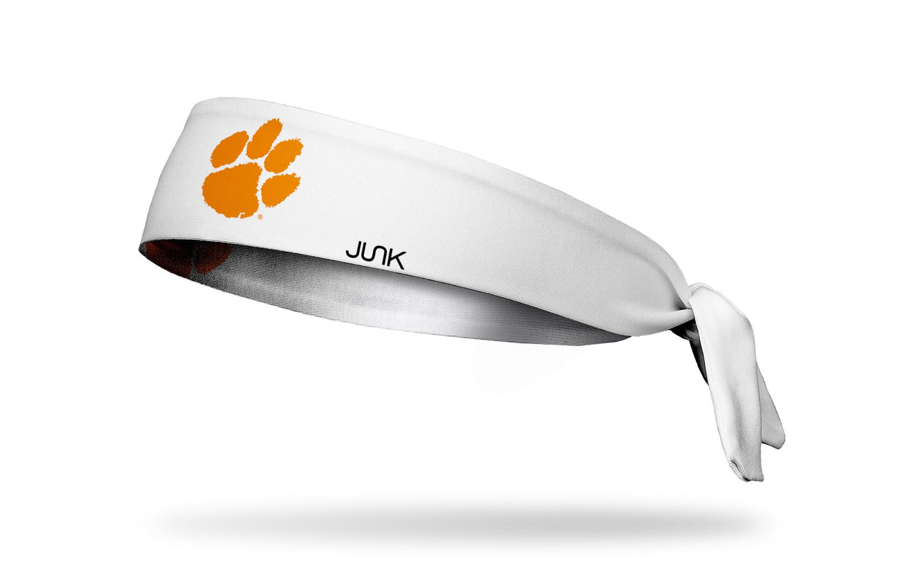 white headband with Clemson University paw print logo in orange