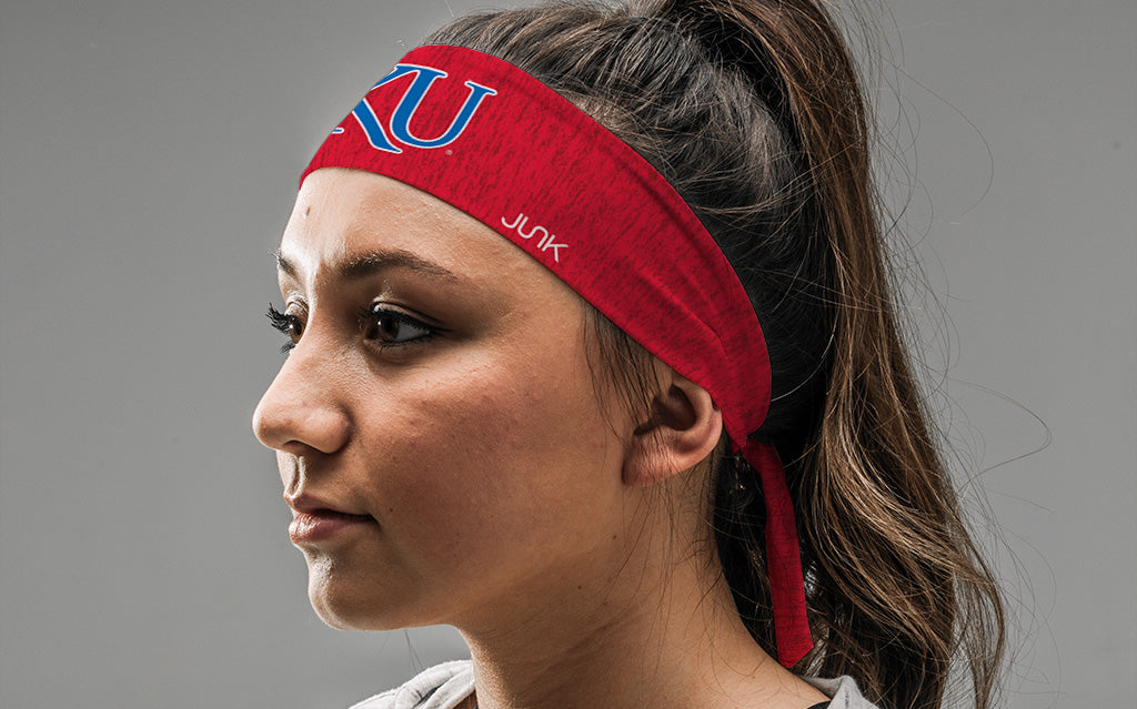 red heathered headband with University of Kansas K U logo in white and royal blue on female