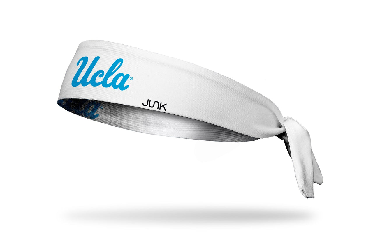 white headband with University of California, Los Angeles UCLA wordmark in light blue